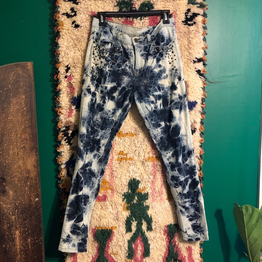 Bleached tie dye print skinny jeans with studs